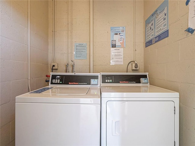 laundry area with washer and clothes dryer