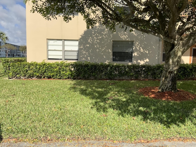 exterior space featuring a lawn