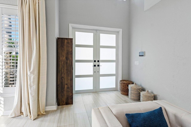 doorway to outside featuring plenty of natural light and french doors