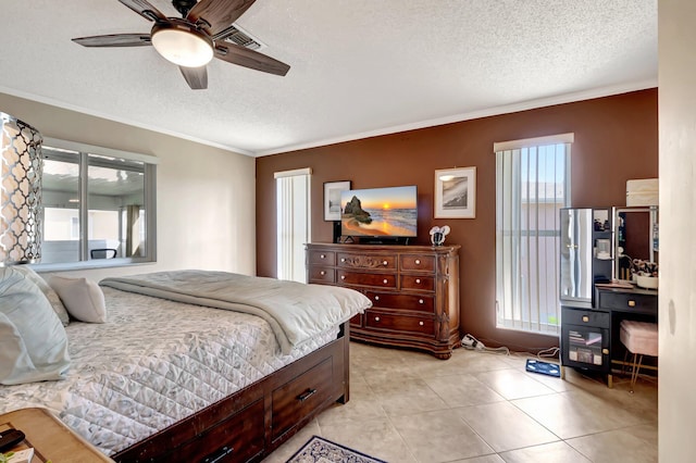 tiled bedroom with ceiling fan, crown molding, and a textured ceiling