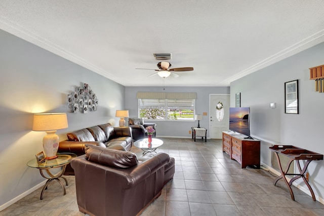 tiled living room with ceiling fan