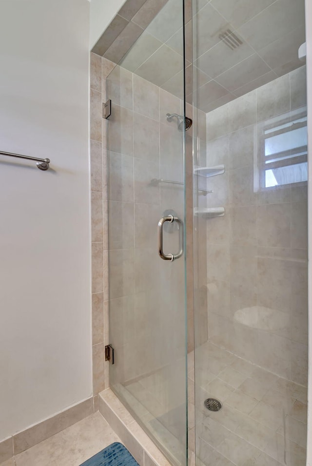 bathroom with an enclosed shower