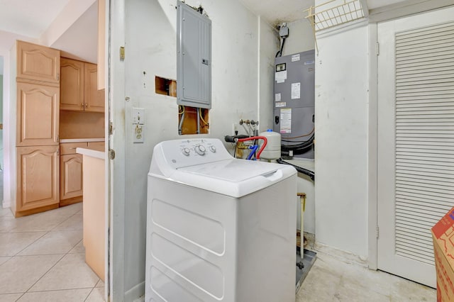 washroom featuring washer / clothes dryer, electric panel, heating unit, and light tile patterned floors