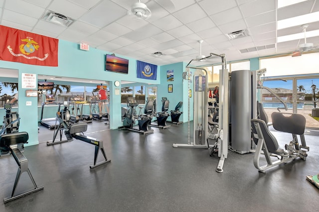 workout area featuring a drop ceiling