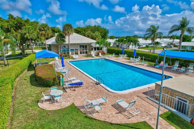 view of swimming pool featuring a patio area