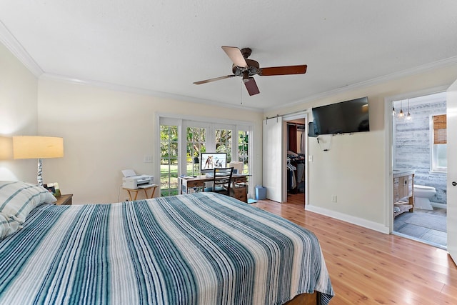 bedroom with ornamental molding, a walk in closet, ceiling fan, and light hardwood / wood-style floors