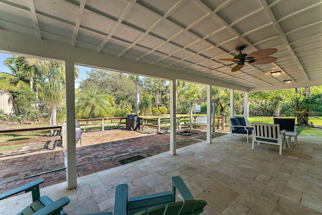 view of patio featuring ceiling fan