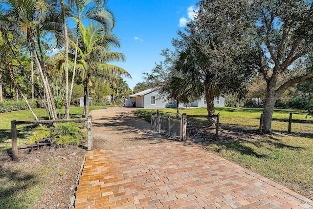 exterior space featuring a front lawn