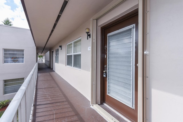 property entrance with a balcony