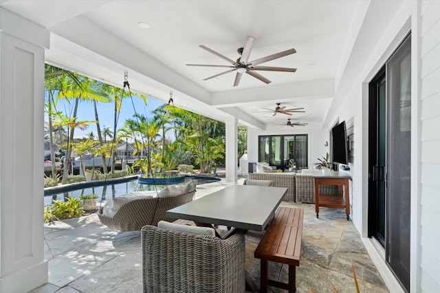 view of patio with ceiling fan