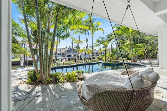 view of swimming pool featuring a patio area