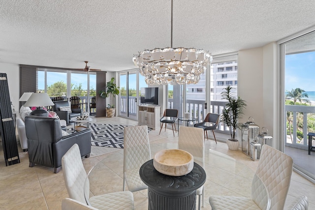 dining room with floor to ceiling windows and a healthy amount of sunlight