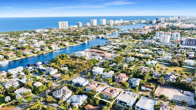 bird's eye view with a view of city and a water view