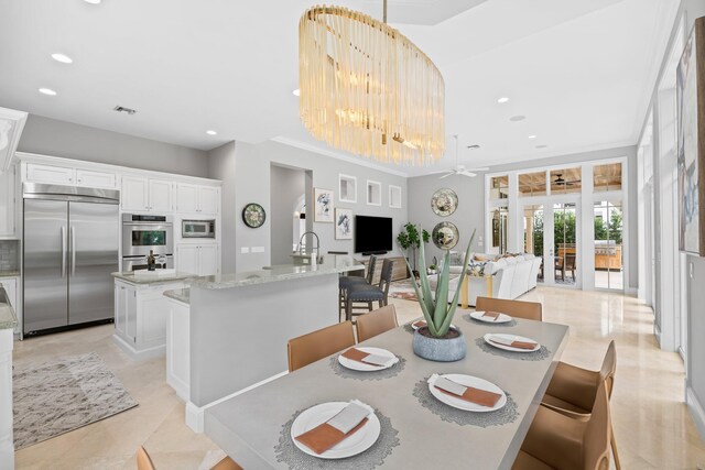 475 NE 4th St, Boca Raton, FL 33432 - dining room with recessed lighting, ornamental molding, and ceiling fan