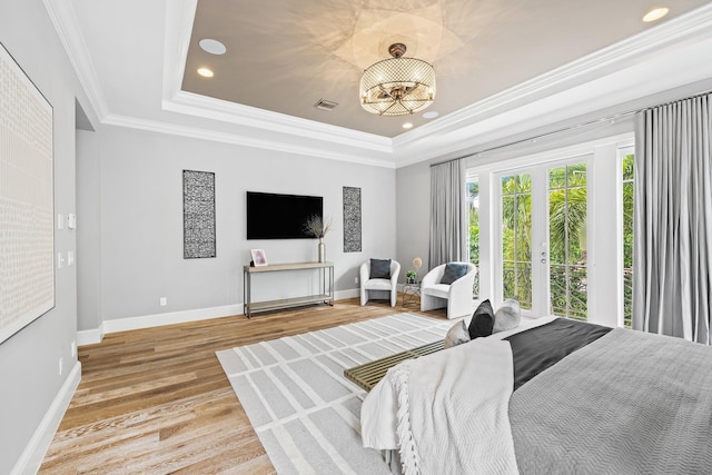 475 NE 4th St, Boca Raton, FL 33432 - bedroom with a raised ceiling, light wood-style floors, ornamental molding, baseboards, and recessed lighting