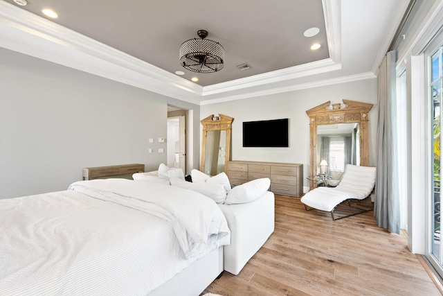 475 NE 4th St, Boca Raton, FL 33432 - bedroom featuring light wood-type flooring, ornamental molding, a tray ceiling, and multiple windows