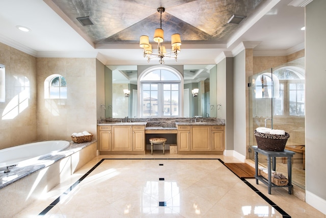 475 NE 4th St, Boca Raton, FL 33432 - bathroom with baseboards, an inviting chandelier, plenty of natural light, and a bath