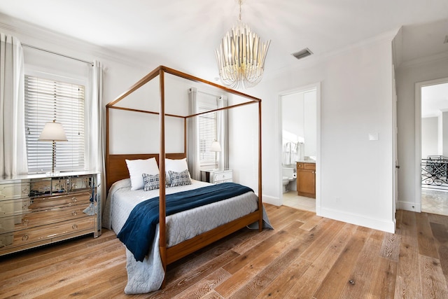 475 NE 4th St, Boca Raton, FL 33432 - bedroom with crown molding, an inviting chandelier, light wood finished floors, baseboards, and visible vents