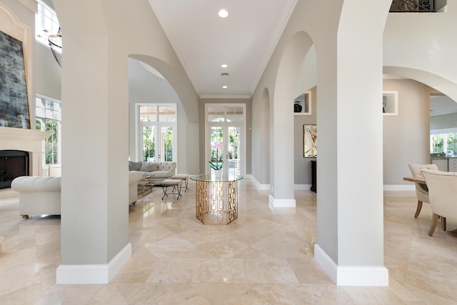 475 NE 4th St, Boca Raton, FL 33432 - corridor with arched walkways, ornamental molding, baseboards, and marble finish floor