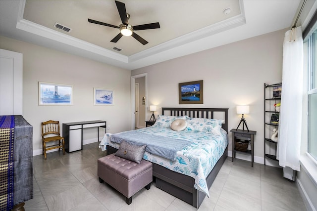 9597 SW Royal Poinciana Dr, Port Saint Lucie, FL 34987 - tiled bedroom with ornamental molding, ceiling fan, and a tray ceiling