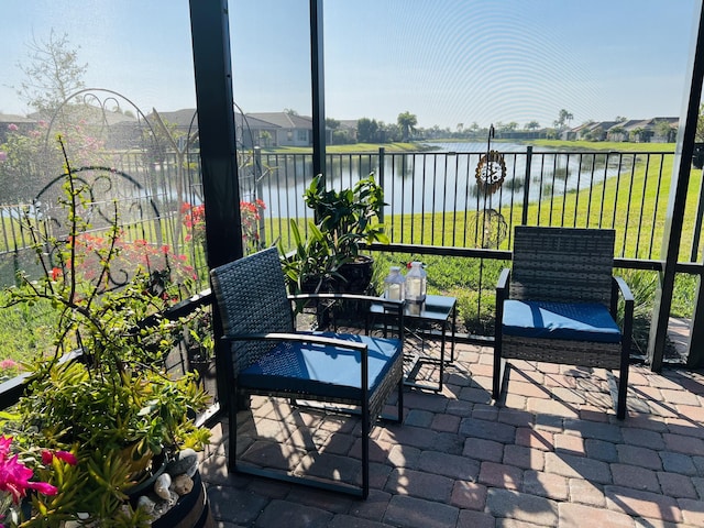 9597 SW Royal Poinciana Dr, Port Saint Lucie, FL 34987 - view of patio / terrace featuring a water view