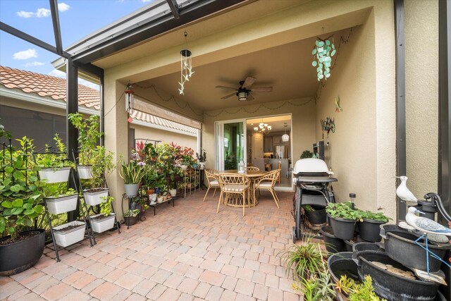 9597 SW Royal Poinciana Dr, Port Saint Lucie, FL 34987 - view of patio featuring a grill and ceiling fan