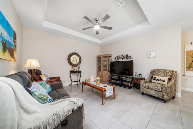 9597 SW Royal Poinciana Dr, Port Saint Lucie, FL 34987 - living room featuring light tile patterned floors, a raised ceiling, and ceiling fan