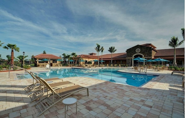 9597 SW Royal Poinciana Dr, Port Saint Lucie, FL 34987 - view of pool featuring a gazebo and a patio