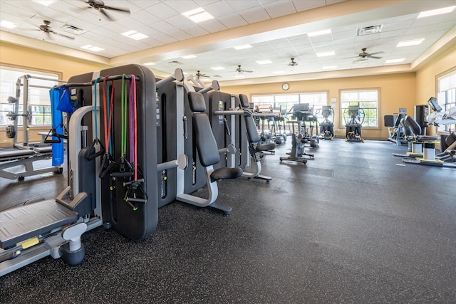 9597 SW Royal Poinciana Dr, Port Saint Lucie, FL 34987 - exercise room featuring ceiling fan and a drop ceiling