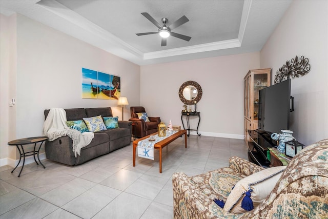 9597 SW Royal Poinciana Dr, Port Saint Lucie, FL 34987 - tiled living room with ceiling fan and a raised ceiling