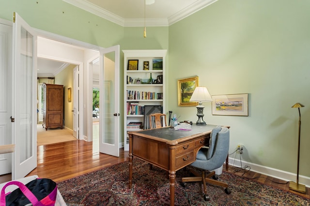 office space with french doors, crown molding, and hardwood / wood-style flooring