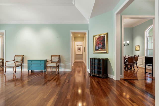 sitting room featuring crown molding and dark hardwood / wood-style floors