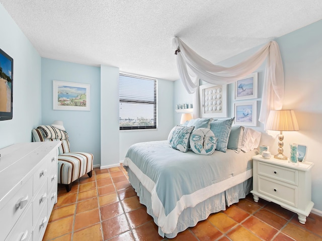 bedroom featuring a textured ceiling