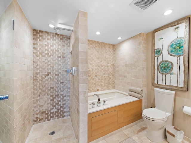 bathroom featuring tile walls, independent shower and bath, and toilet