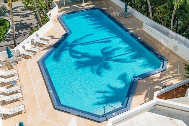 view of swimming pool with a patio