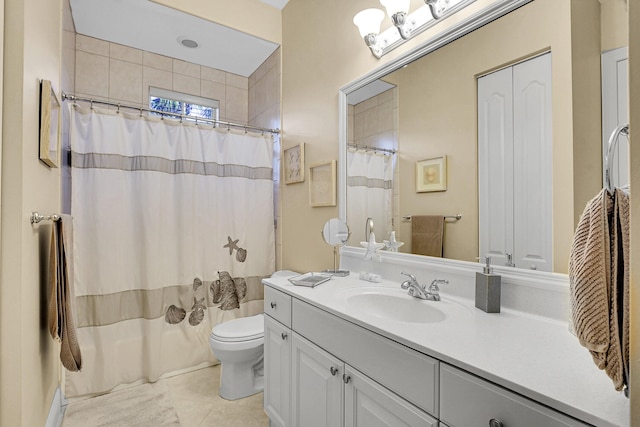 bathroom with vanity, curtained shower, and toilet