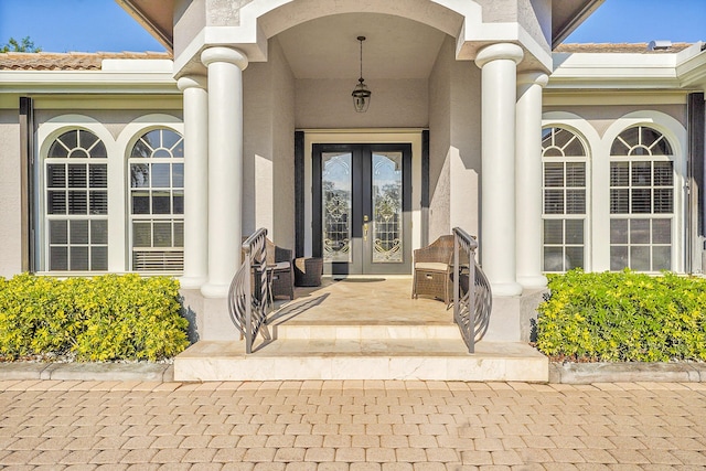 doorway to property featuring french doors