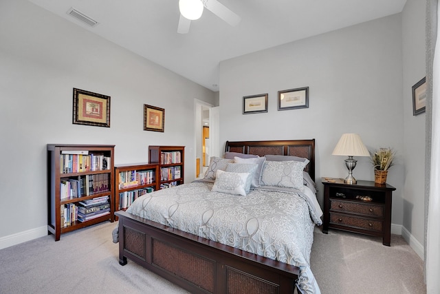 bedroom with light carpet and ceiling fan