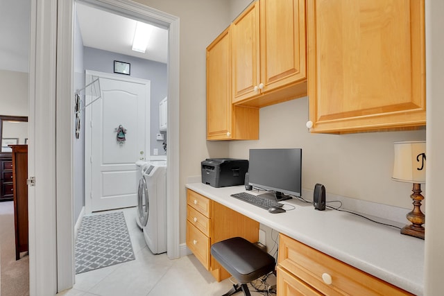 office space featuring separate washer and dryer and built in desk