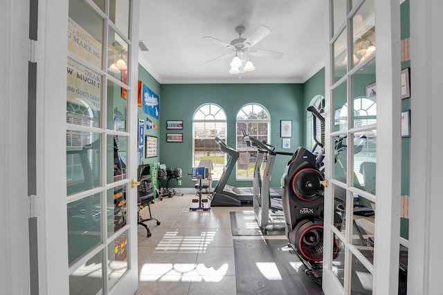 interior space with ornamental molding, french doors, and ceiling fan