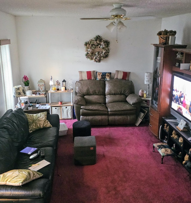 carpeted living room with ceiling fan and a textured ceiling