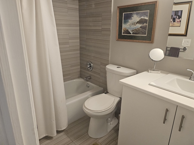 full bathroom with shower / bath combination with curtain, vanity, and toilet