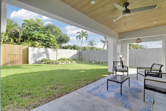 view of patio featuring a ceiling fan and a fenced backyard