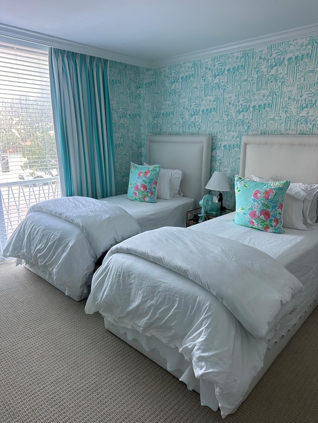 carpeted bedroom with crown molding