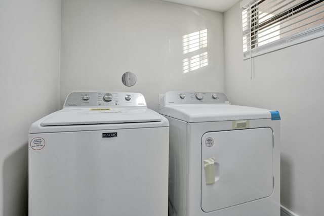 laundry room with washing machine and dryer