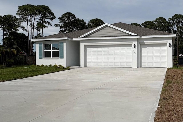 3177 SW Collings Dr, Port Saint Lucie, FL 34953 - single story home featuring a garage, driveway, and stucco siding