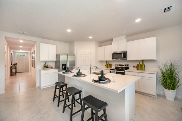 tiled dining space featuring sink