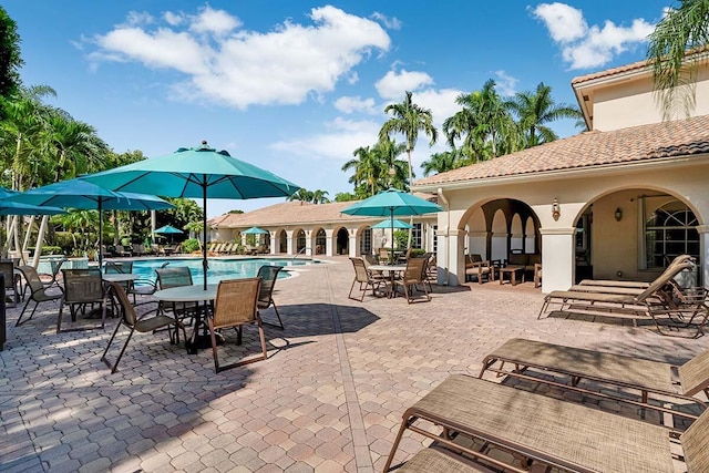 view of patio with a community pool