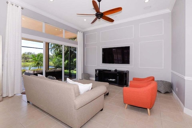 9895 SW Nuova Way, Port Saint Lucie, FL 34986 - living room featuring ceiling fan, ornamental molding, and light tile patterned floors