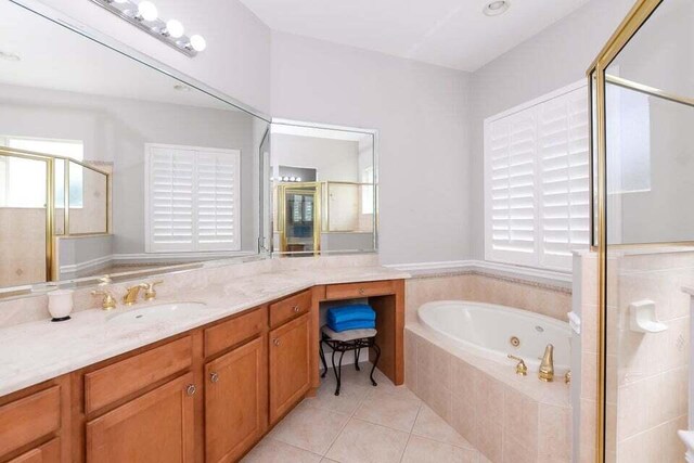 9895 SW Nuova Way, Port Saint Lucie, FL 34986 - bathroom with tile patterned flooring, vanity, and shower with separate bathtub
